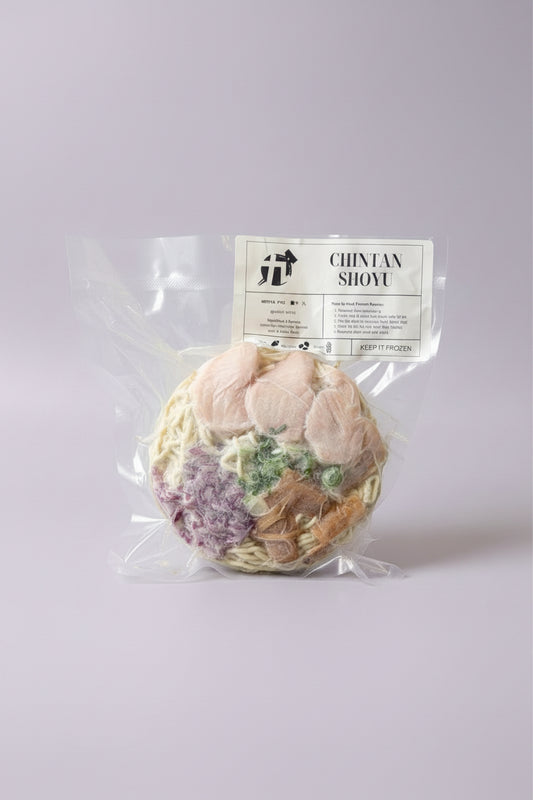 Packeged chicken chintan shoyu flavour frozen ramen with chicken chashu, menma, red onions and scallions